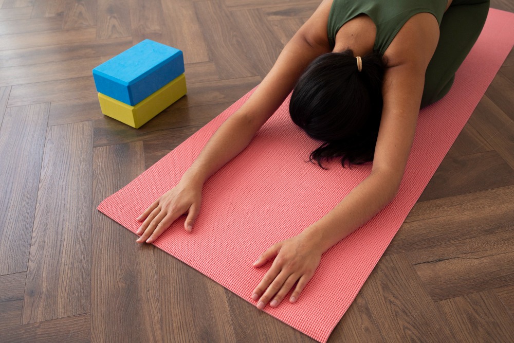child pose di matras yoga